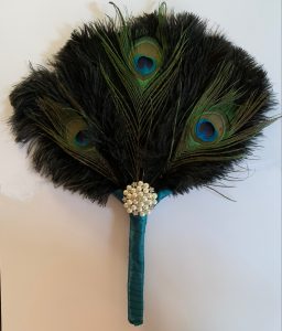 Fan decorated with feathers