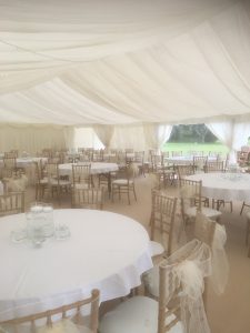 Marquee interior with round tables
