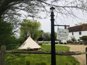 Bell tent on front lawn