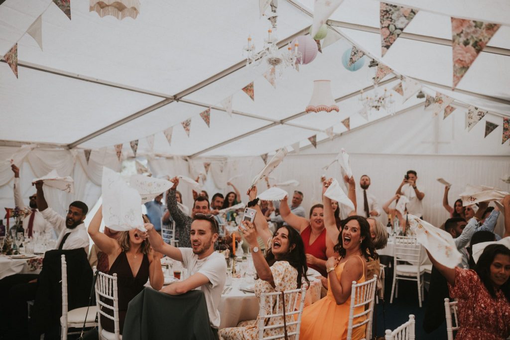 marquee with bunting and guests