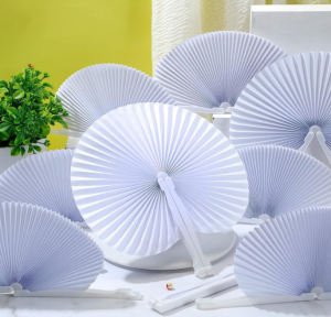 photo of paper fans - one of our tips for beating the heat