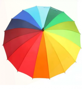 Colourful umbrellas for a blank canvas wedding in the rain